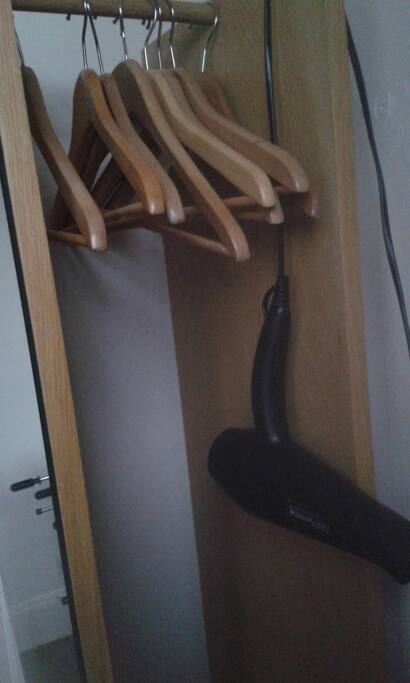 Hanging space, hairdryer, full length mirror (very difficult to photograph!)