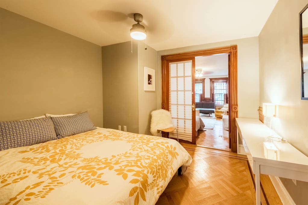 Bedroom 2: Adjacent to the large bedroom, and is situated in the middle of the apartment. It is always set with a queen sized bed, a chair, and a large mirror.