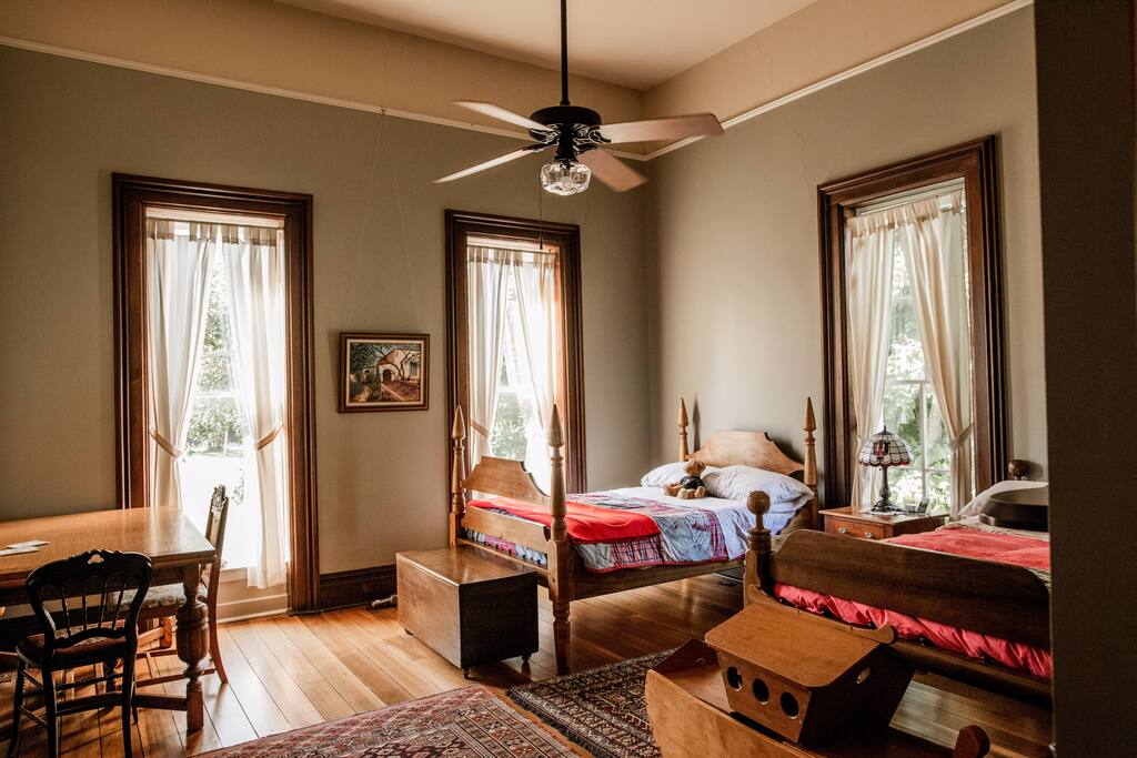 The Kid's Room has two antique three-quarter beds.