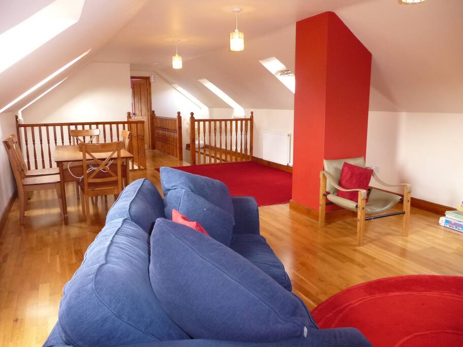 Upstairs studio area with sofa bed for added capacity