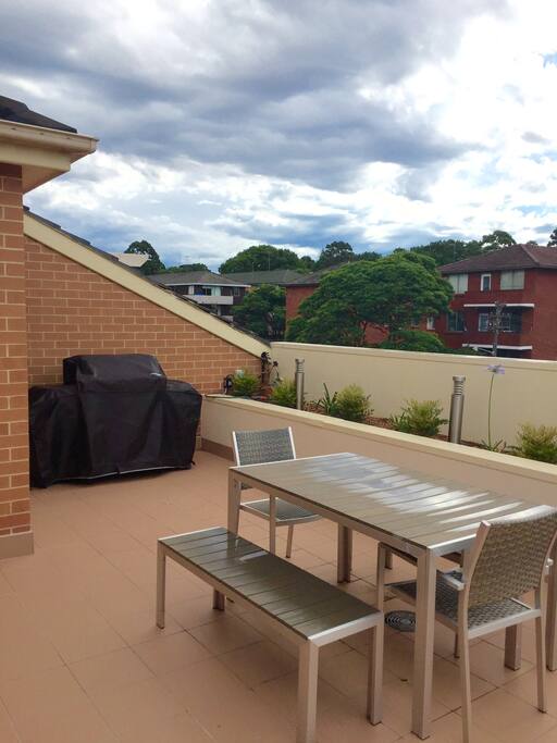 Large four burner bbq with side wok. outdoor dining table