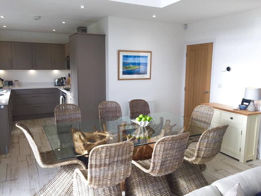 Driftwood dining table with Richard Dunwoody Northumbrian photography