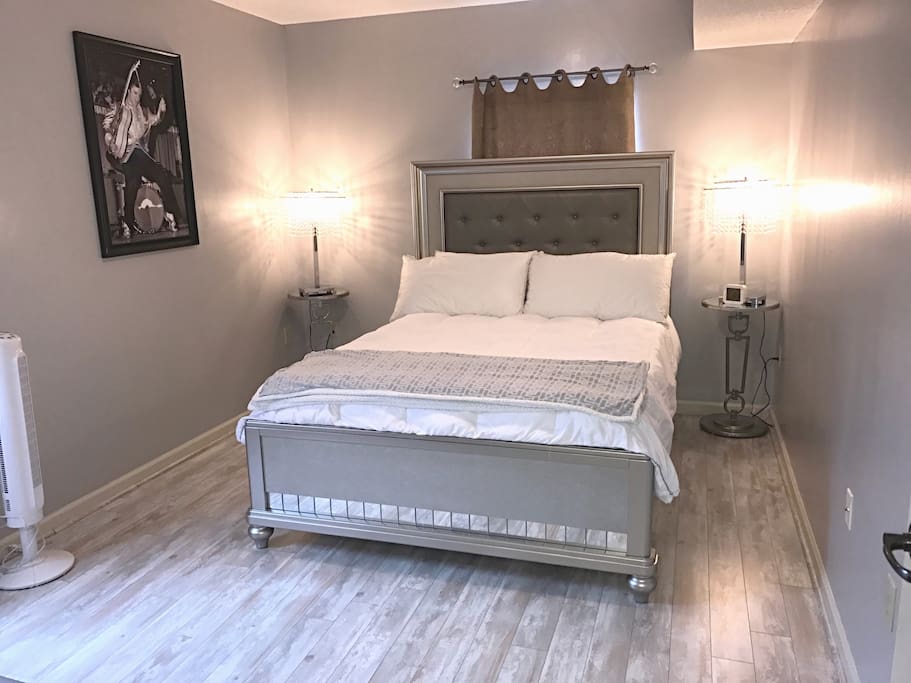 The bedroom boasts a Queen bed with memory foam mattress.