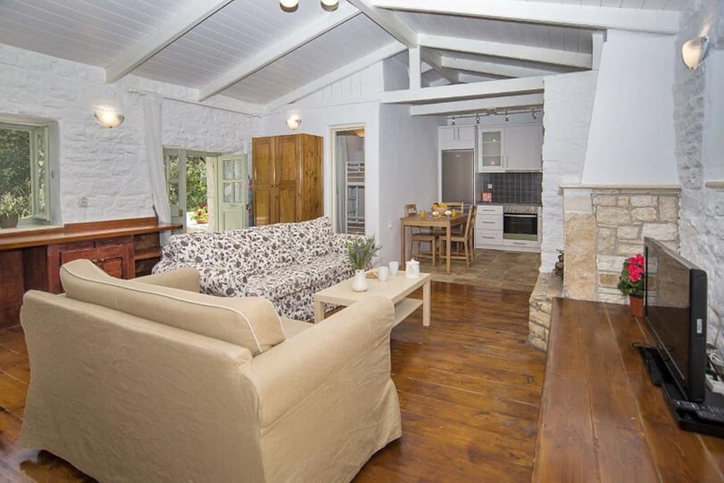 open plan kitchen with dinning and sitting area