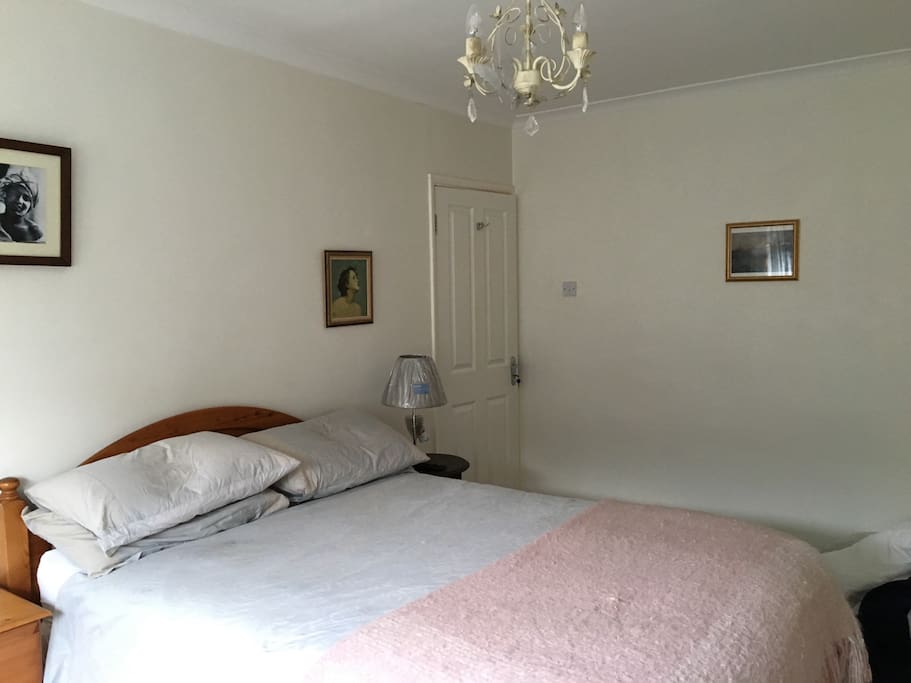 Comfortable bed, bedroom at the back of the house looking out onto the garden.