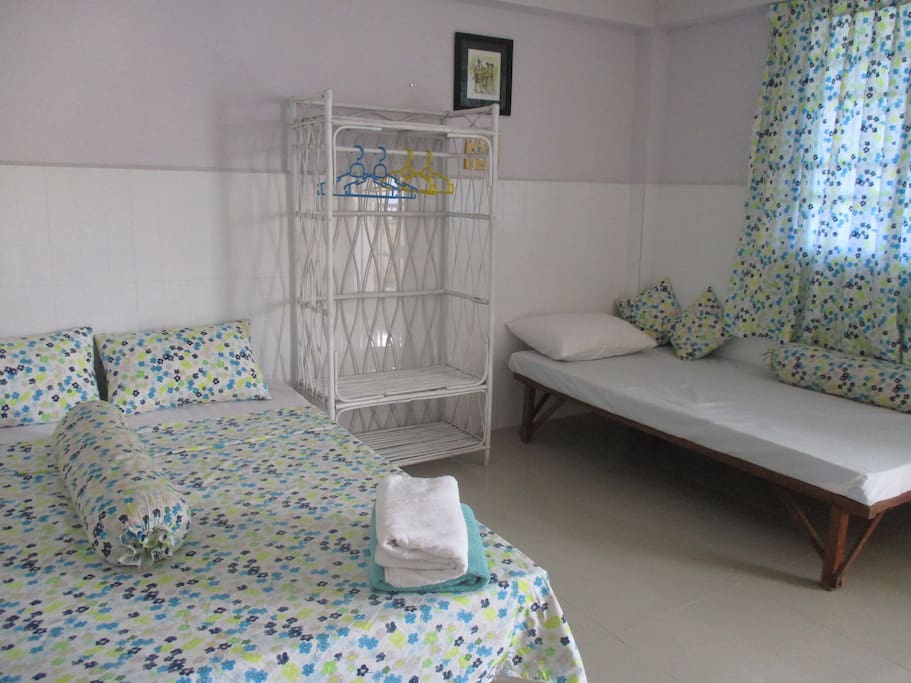 Sochea's Room (triple basic en-suite - 1 king size and 1 single bed) with fans
