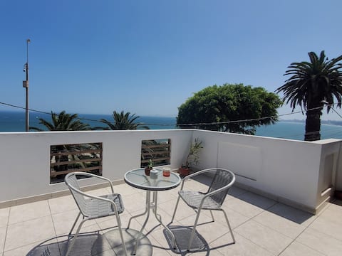 Mini with an ocean view and an enclosed condominium