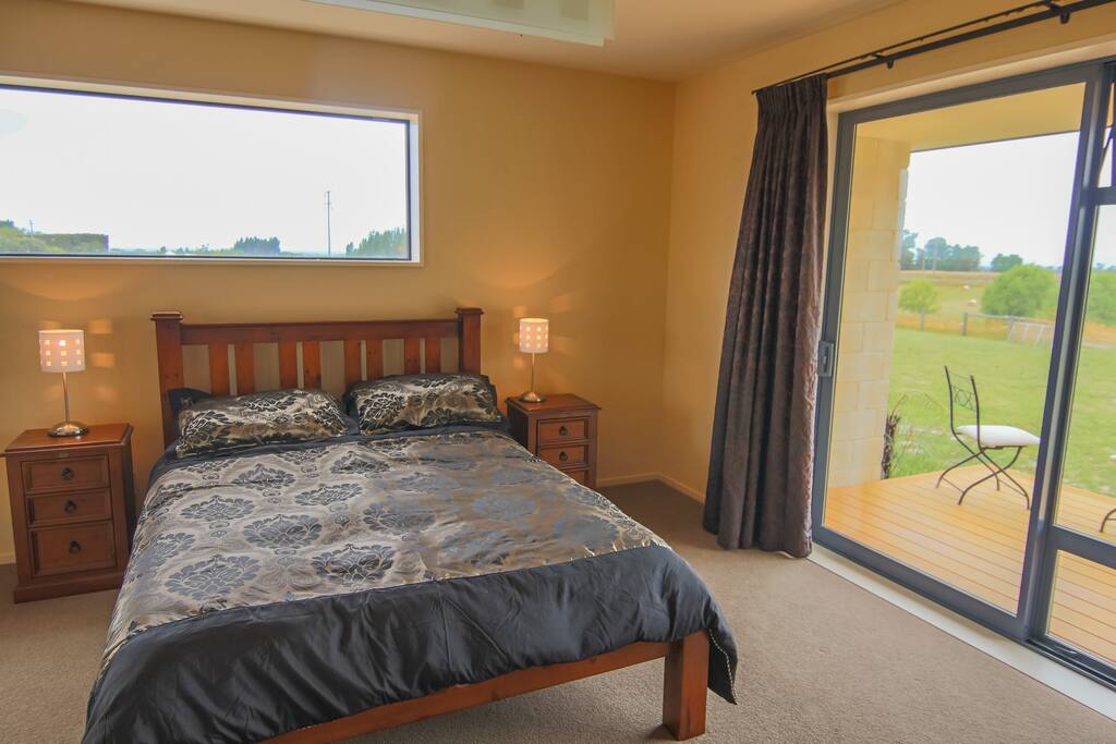 Guest room with deck overlooking our farm