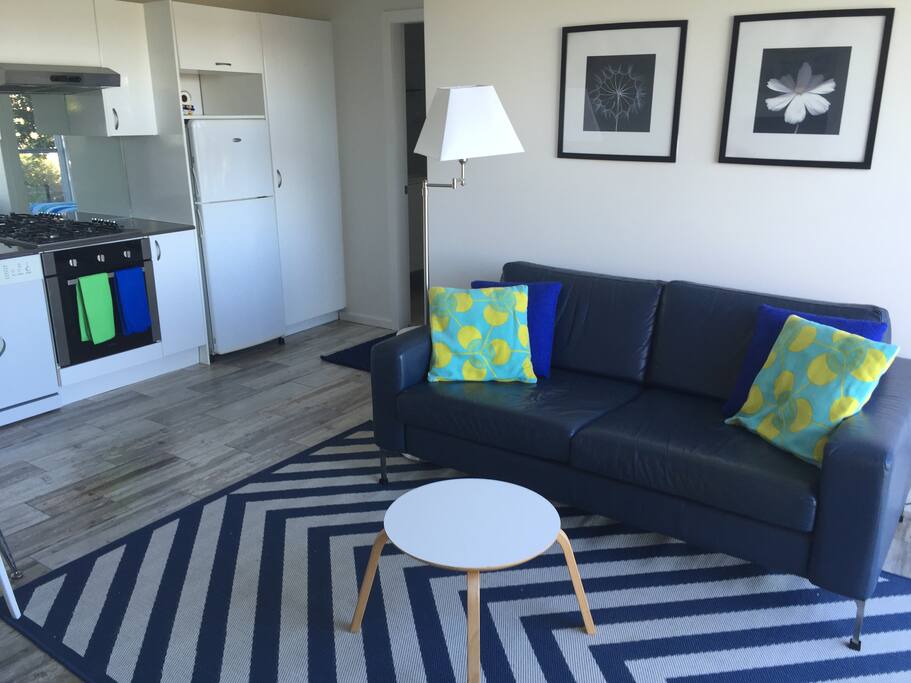 Comfy living room with soft and roomy leather sofa