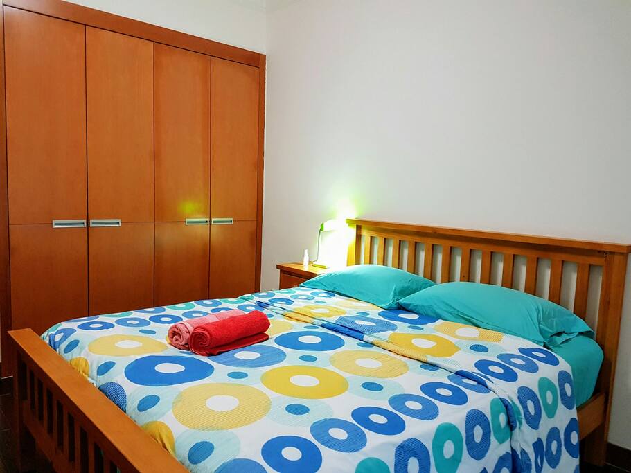 the second bedroom with fine bedding