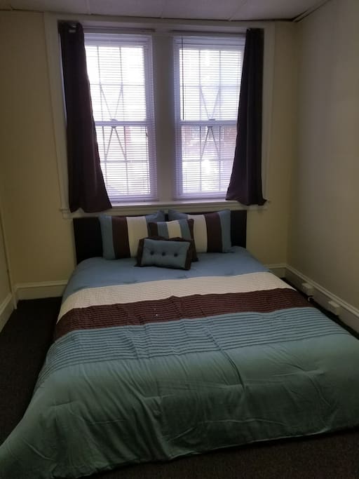 Queen size bed with large window