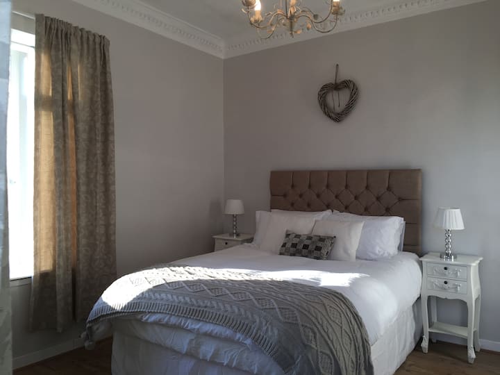 Bedroom 1 sleeps two people on a King size bed, there is also a travel cot ready to set up.