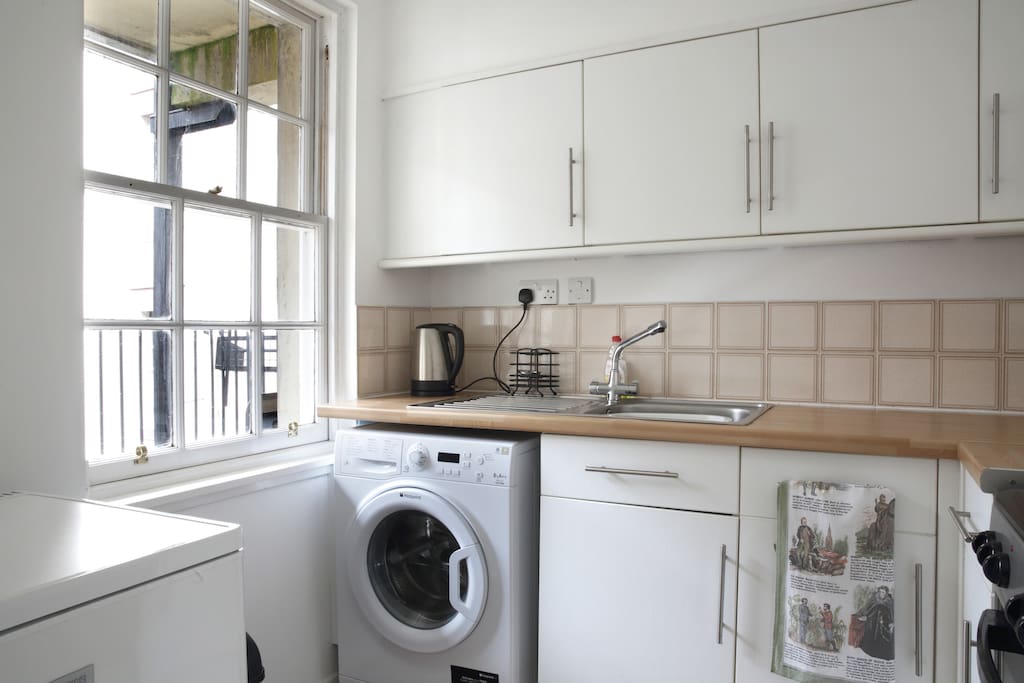 kitchen includes plenty cupboard space and includes tea, coffee, biscuits etc. Also includes a new washing machine