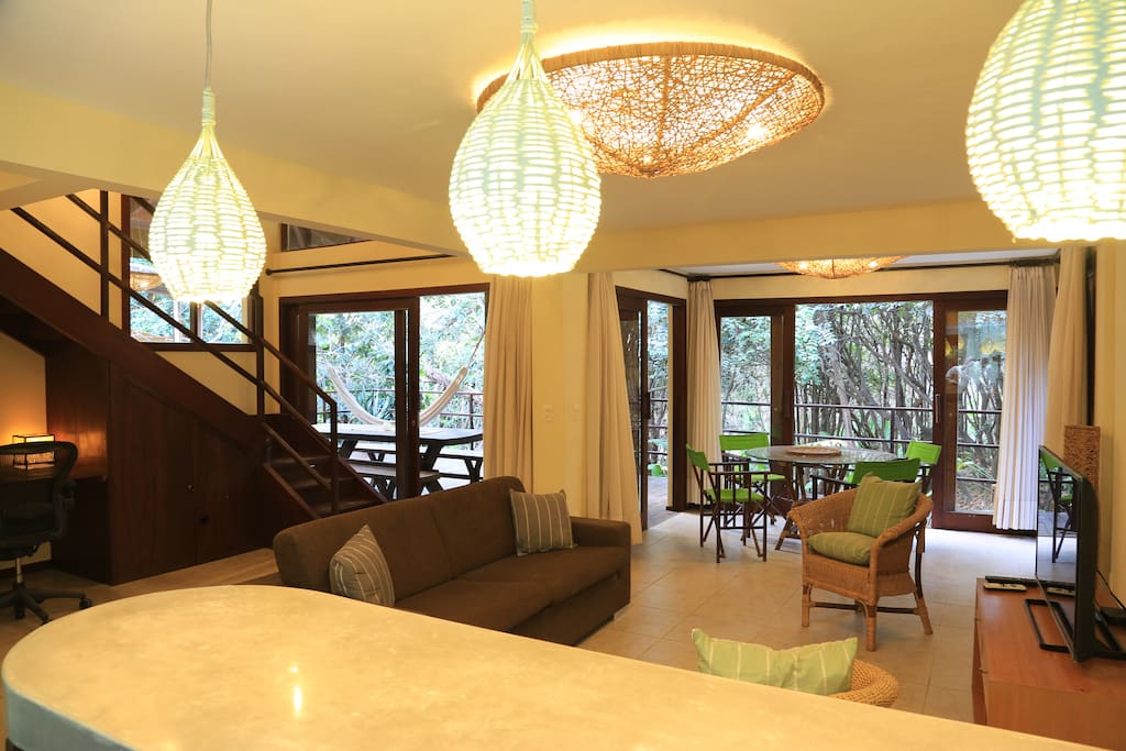 Living room looking towards the tree-lined terrace