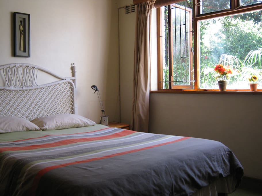 Spacious, sunny fully furnished, double room overlooking garden