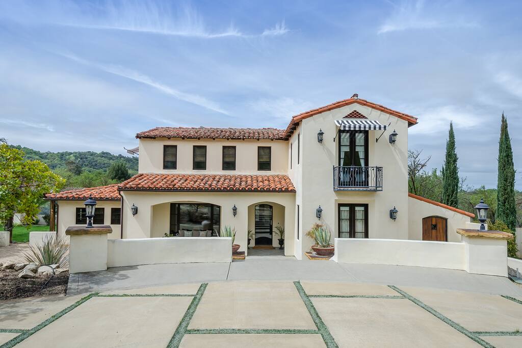 The Front Of The House w/ Circular Driveway