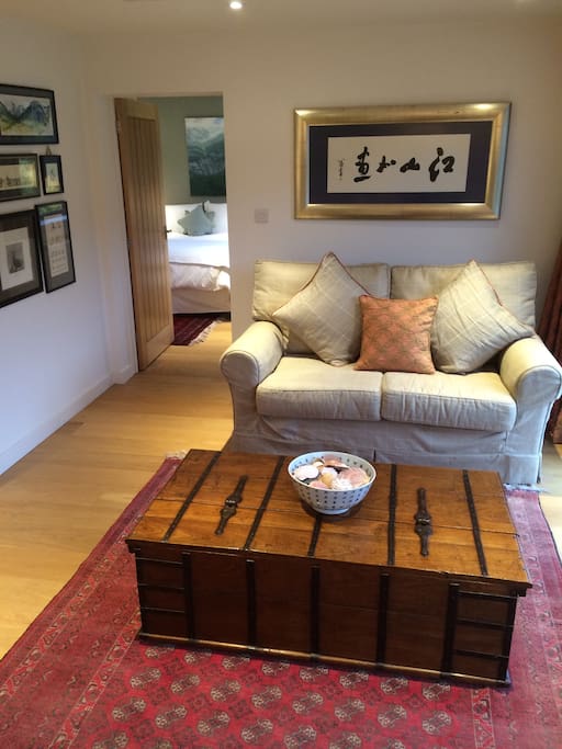 Seating area and sofa bed and the bedroom beyond