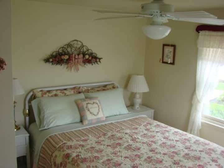 Small but cozy and comfortable queen bedroom with mountain view.