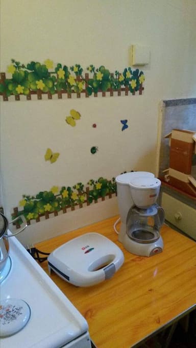 Stove, coffee machine ,and small grill for your morning bread