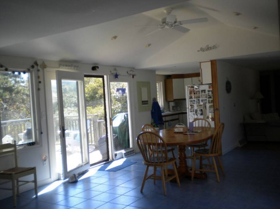 kitchen with french doors to back porch and custom dining table