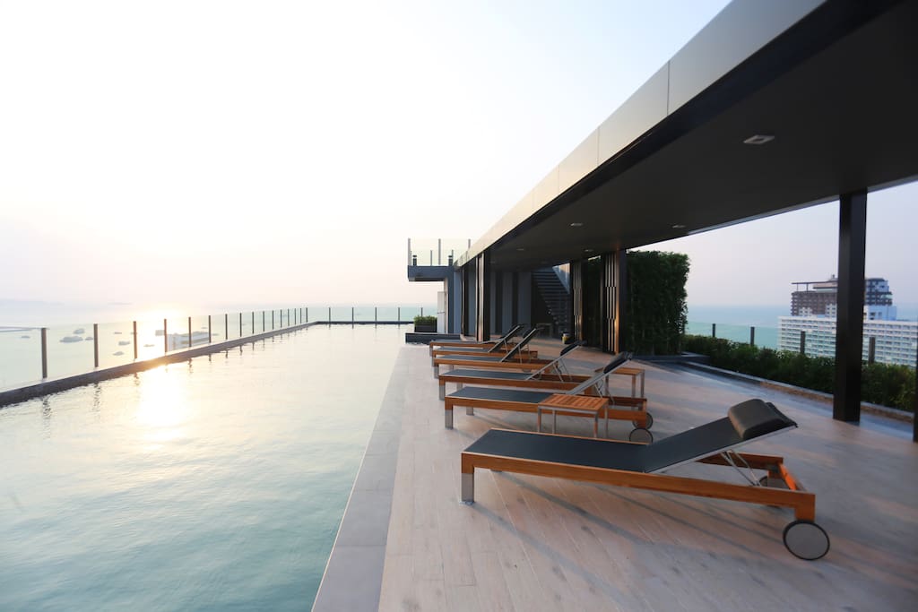 Rooftop Swimming Pool with Sunset View