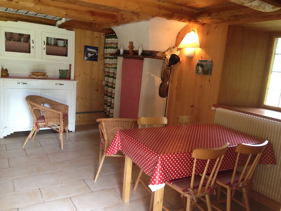 The main room, fire place and table