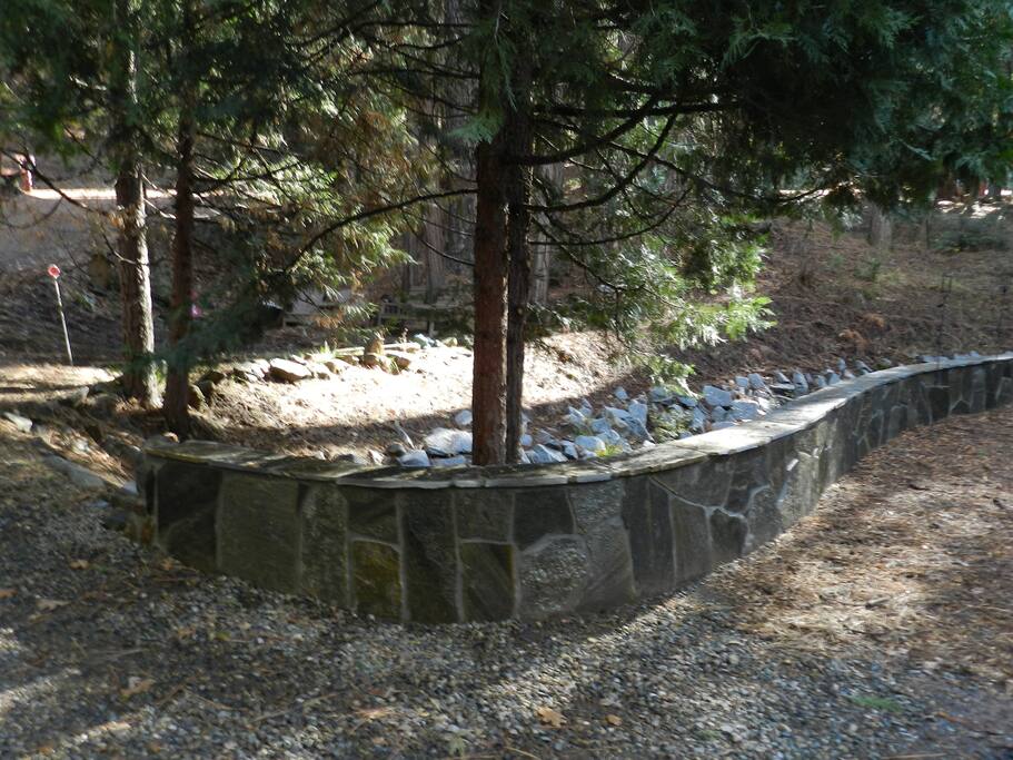 Beautiful sitting wall next to the creek.