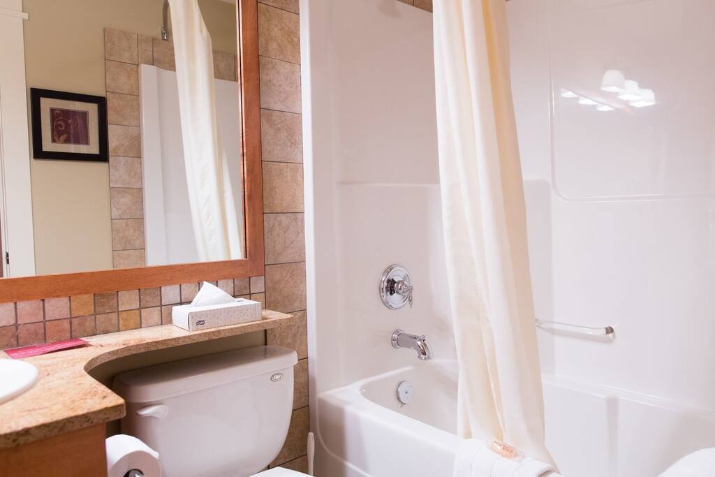 The bathroom is modern and clean