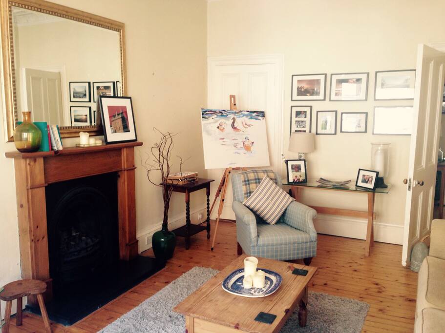 Large bright living room with views onto Bruntsfield Avenue.