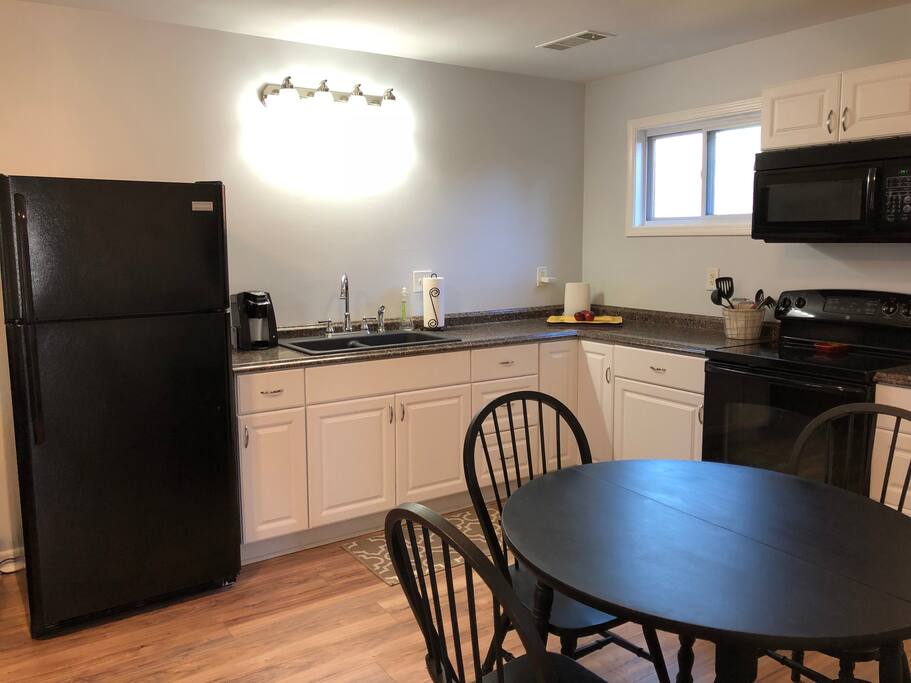 The full kitchen is equipped with a Keurig coffee maker. We provide coffee, half and half, and sugar.