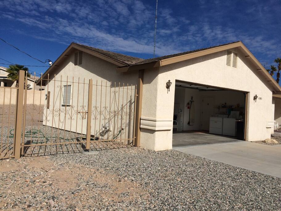 PARKING BEHIND 10' WIDE SWING GATE / HOSE BIB FOR WASHING
