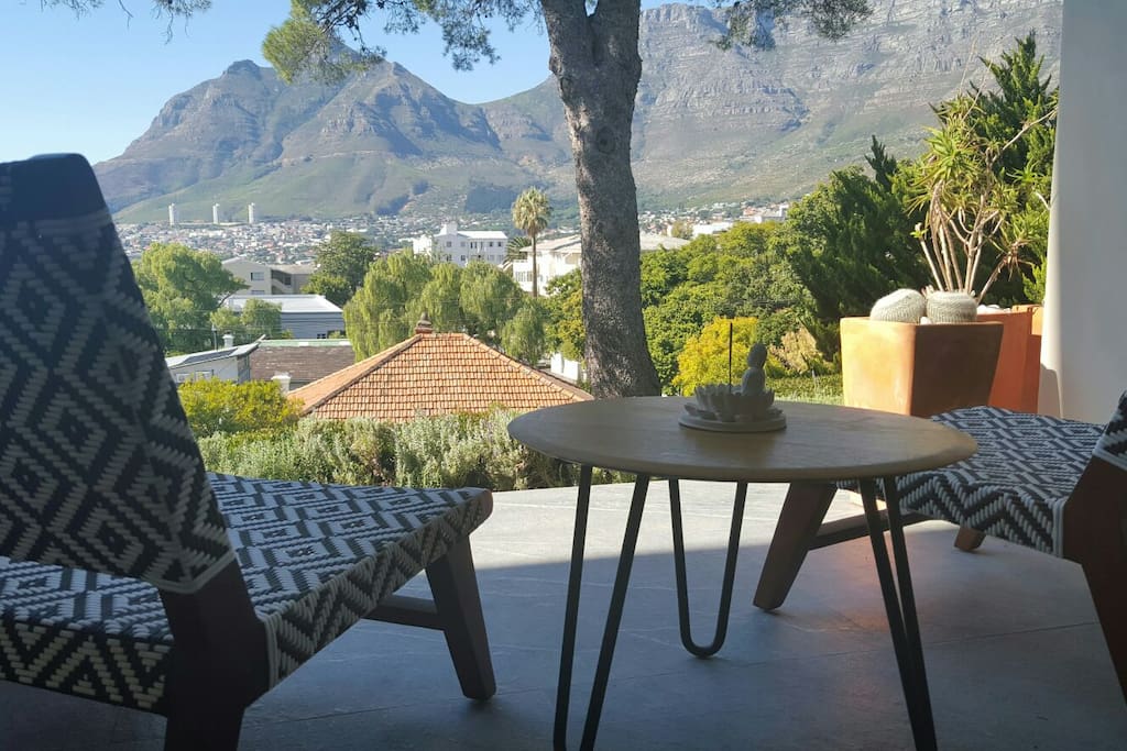 Breathtaking views over Cape Town City Bowl, Table Mountain and Signal Hill from the ground floor guest bedroom.