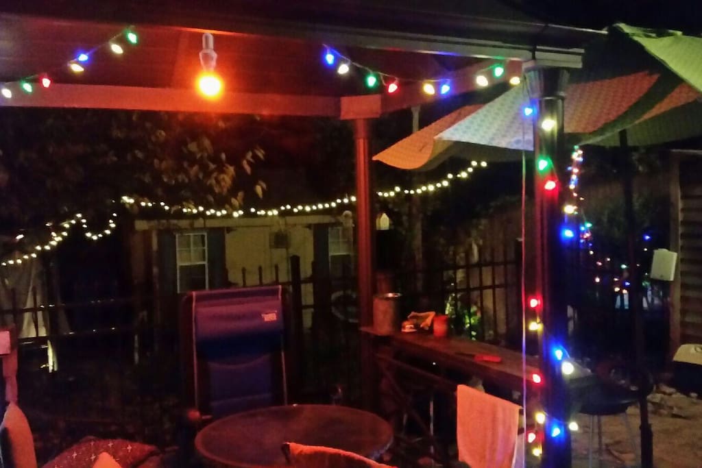 Looking from back of the house, patio gazebo and grill area towards the private hot tub (far left) and the Zena-shed