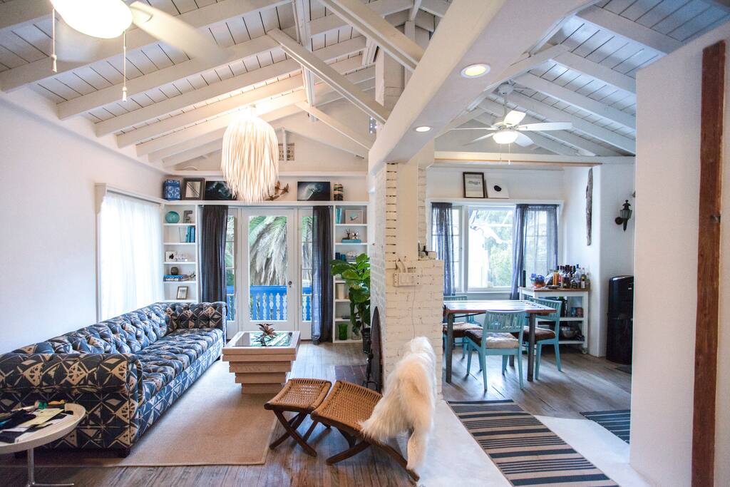 Open floor plan and exposed beamed ceilings will give you a wonderful airy feel