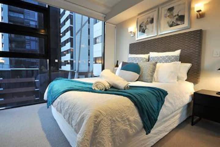 Master Bedroom with balcony access. 1000TC Luxury Sheets, Luscious Pillows and Sheridan Towels