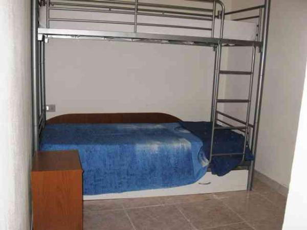 ที่พักพร้อมเตียงสองชั้นในห้องนั่งเล่น