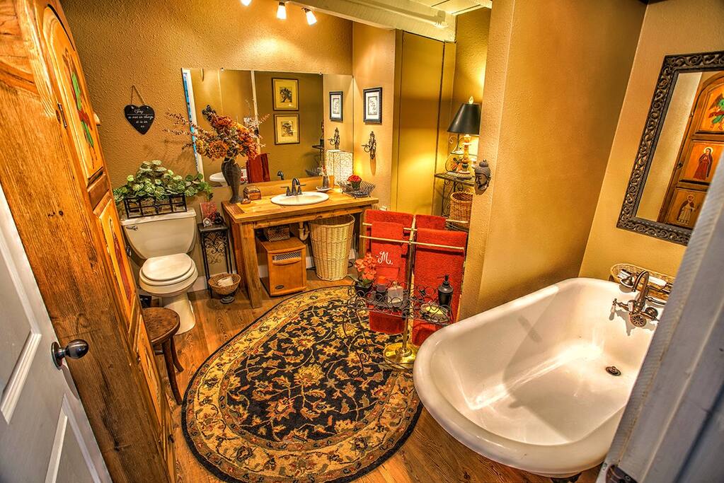 Bathroom with clawfoot tub and sprayer