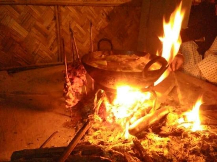 Preparing food in open fire