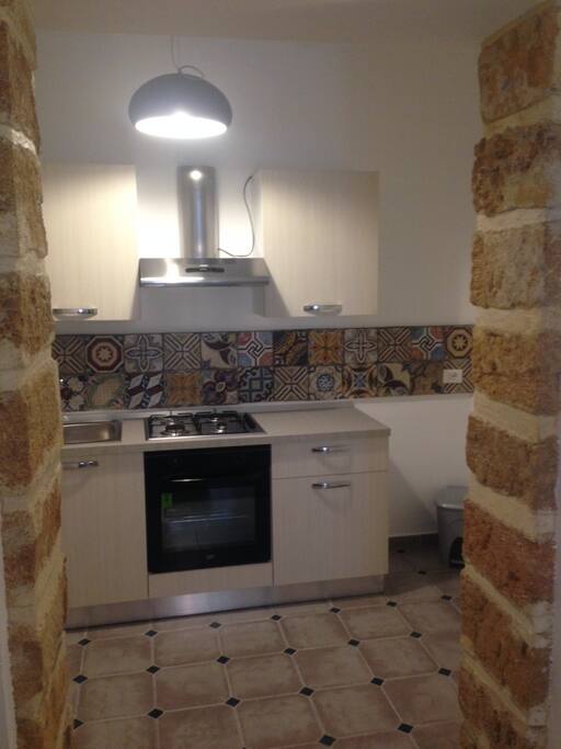 cucina attrezzata condivisa