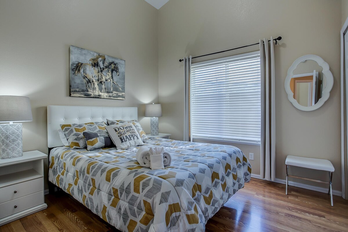 1st floor bedroom with queen size bed, and closet- conveniently located near bathroom 2 