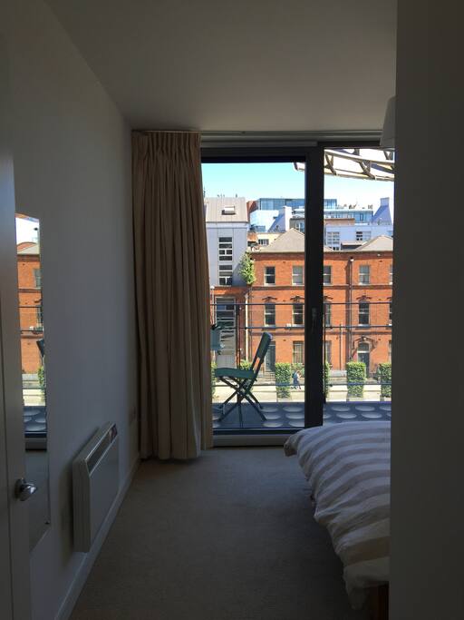 2nd Bedroom with double bed. Sliding doors onto balcony