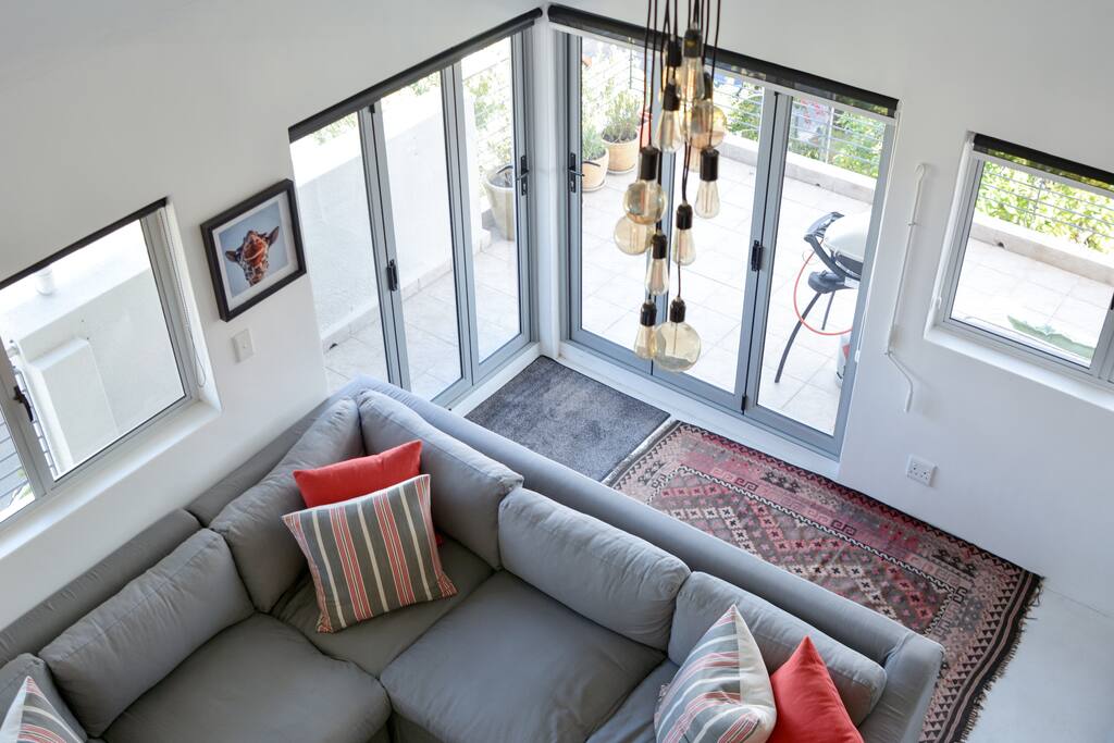 TV room / lounge looking onto outside balcony