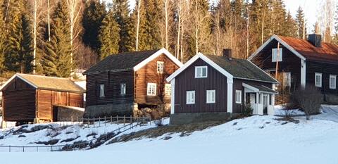 An old farm from the 1600s with a timber house.
