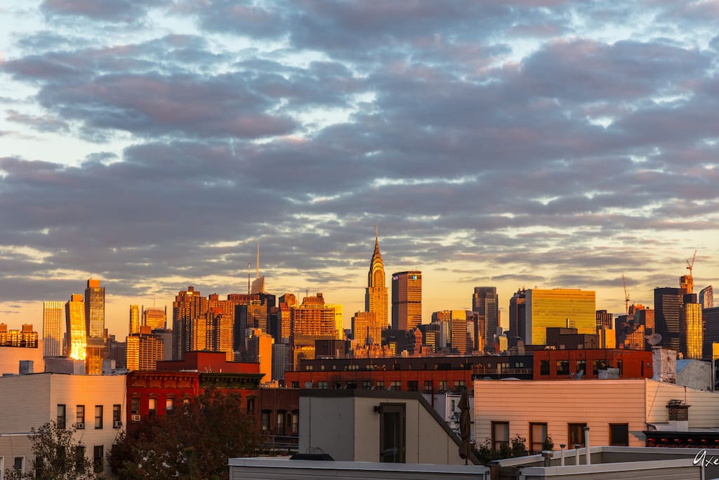 The view: The Manhattan Skyline. This is actually a photo from a guest! He woke up early just to catch the sunrise on the terrace. Sunsets and Sunrises are truly gorgeous here. The city looks closer in real life :)