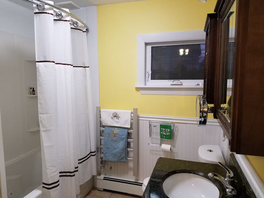 Full bathroom with Jacuzzi tub