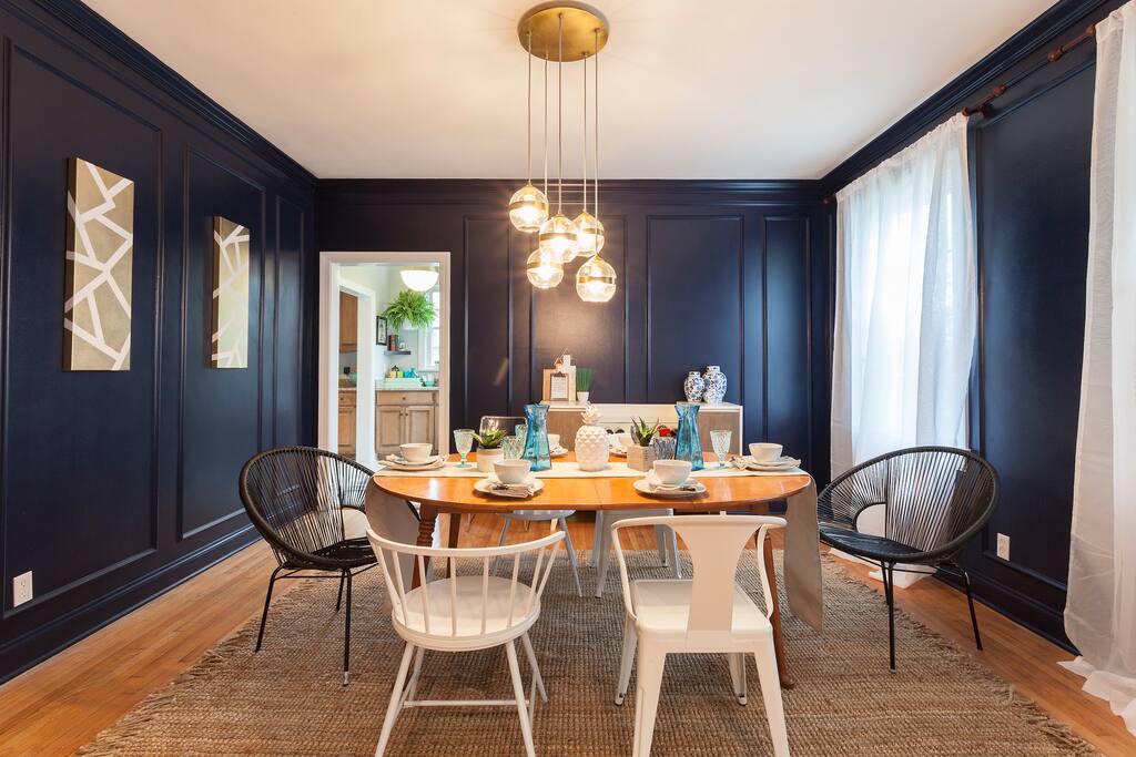 The table is set for 6, but extra chairs are provided for larger groups!