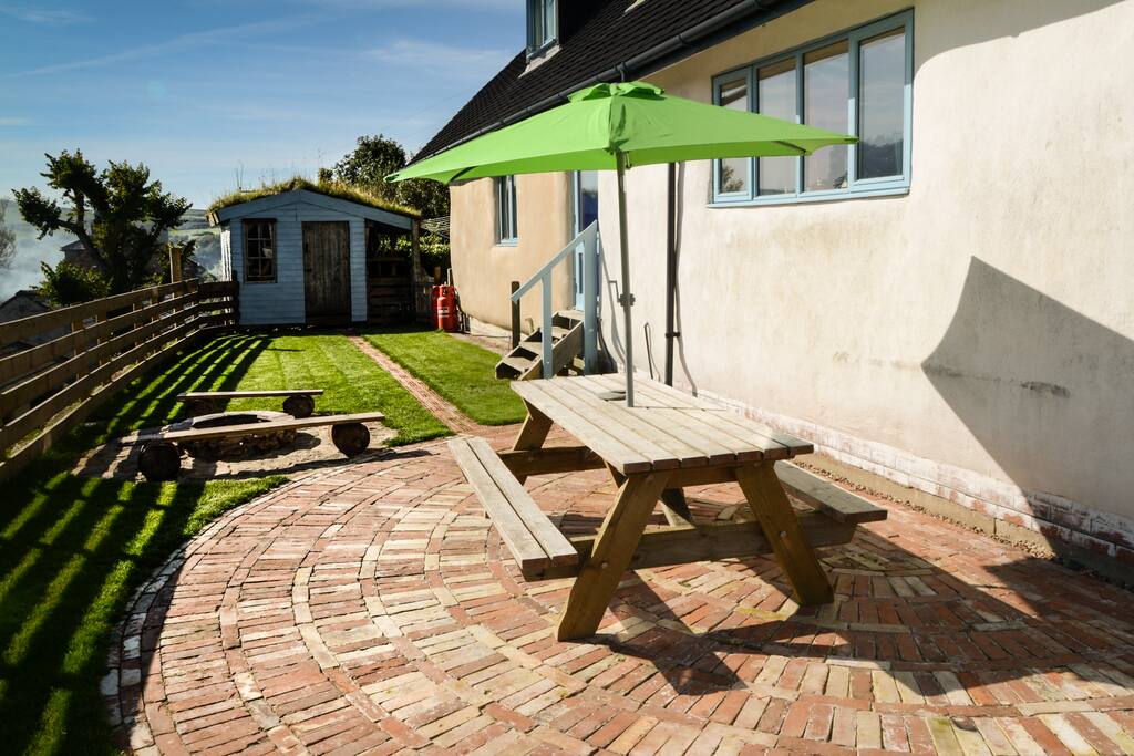 Patio, BBQ, lawn and turf roof shed