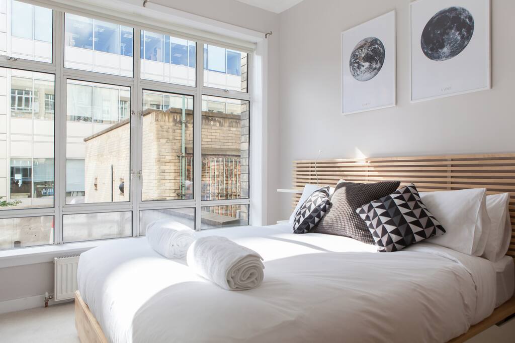 King size bed with stylish, minimalist interior design