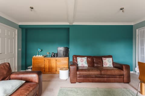 Popular Airbnb listing: Double bedroom, en suite and private living room in Lymington And Pennington