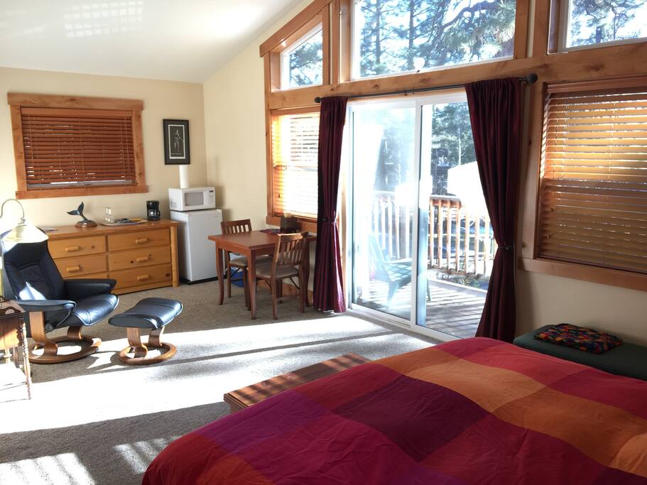 Relax and rest in my roomy "California King" bed and luxurious leather reclining chair, or on the front deck.